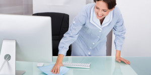 female-worker-cleaning-office